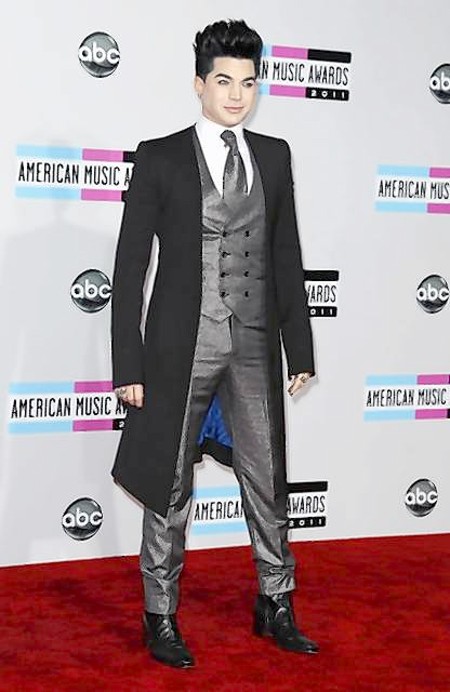 Singer Adam Lambert poses backstage at the 2011 American Music Awards in Los Angeles