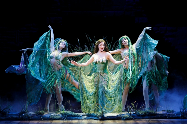 Laura Griffith, center, stars as the Lady of the Lake in the all-local cast of Monty Python's Spamalot at The 5th Avenue Theatre. Credit Mark Kitaoka
