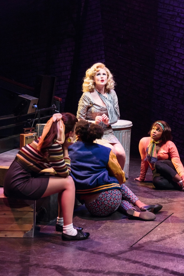 Audrey (Jessica Skerrit, center) and the trio (l-r) Crystal (Naomi Morgan), Chiffon (Alexandria Henderson), and Ronette (Nicole Rashida Prothro) in Little Shop of Horrors, a co-production of ACT and The 5th Avenue Theatre. Credit: Tracy Martin