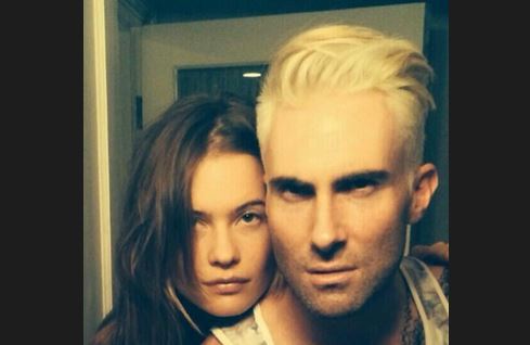 Adam Levine goes Platinum...girlfriend Behati Prinsloo seems to approve as she also appears to be cornholing the "rock" superstar.