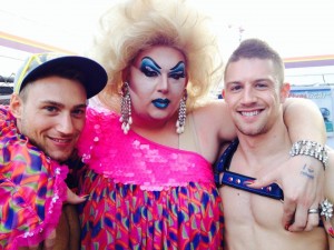 Mama Tits can be seen posing for the camera with Chad Michael and Seattle's #PushyBottom Alexander Manila at The Cuff's 2014 Pride Block Party