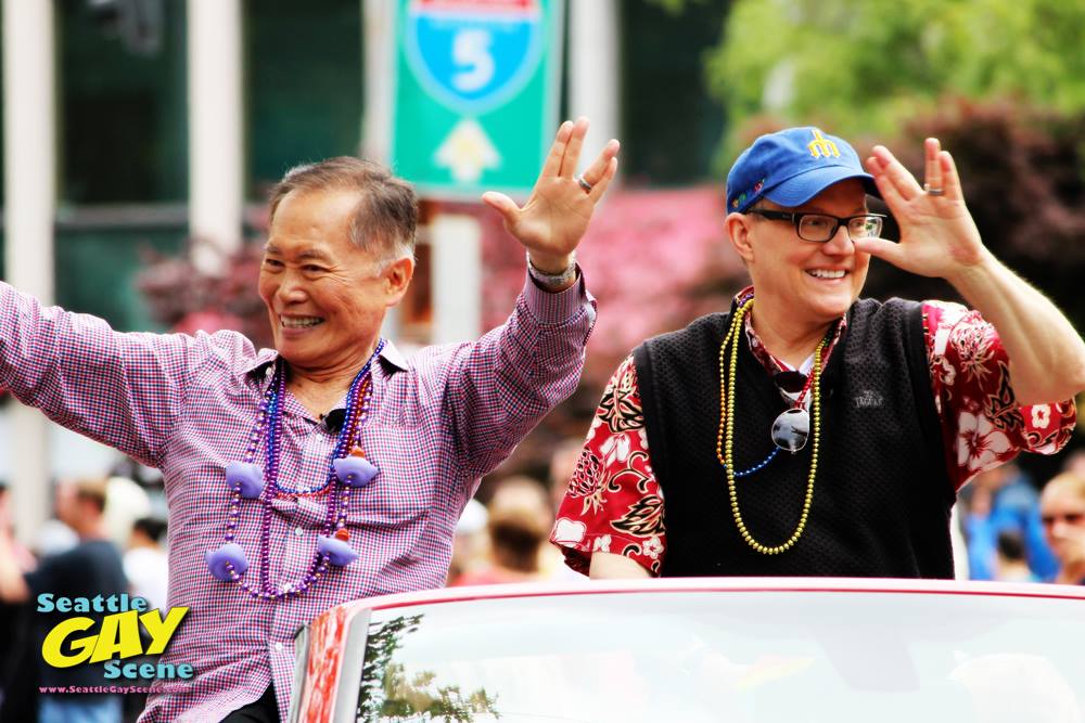 Celebrity Grand Marshal for the 2014 Seattle Pride Parade, actor/activist George Takei and husband Brad Altman. Photo: Kathy Ann Bugajsky for Seattle Gay Scene.